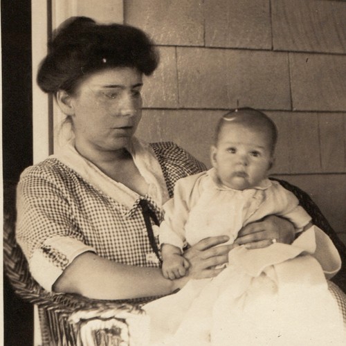 C1910s mother holding gown - holding,